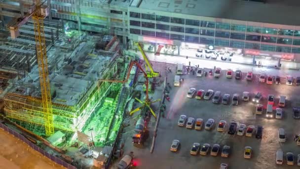 Aerial view of construction with special machines in Business Bay, Dubai timelapse — Stock Video