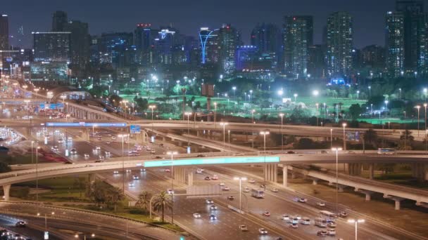 Aerial night view of empty highway and interchange without cars in Dubai — Stock Video