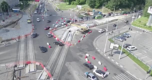 Road reconstruction with tram rails intersection, construction site — Stock Video