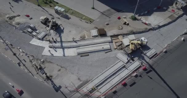 Road reconstruction with tram rails intersection, construction site — Stock Video