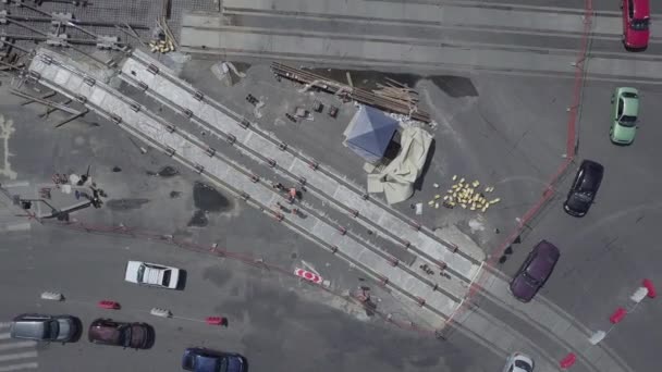 Road reconstruction with tram rails intersection, construction site — Stock Video