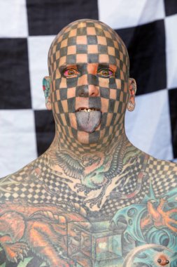 AMSTERDAM, THE NETHERLANDS - MAY 27, 2017: Matt Gone world's most tattooed man at the International Tattoo Convention Amsterdam 2017 in the RAI congress center. clipart