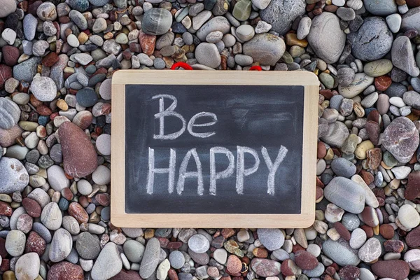Phrase Be Happy on blackboard — Stock Photo, Image