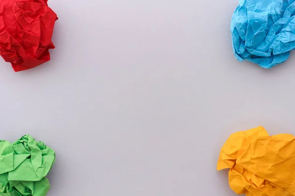 Colorful paper balls in corners — Stock Photo, Image