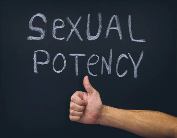 Word Sexual Potency and thumb up hand below — Stock Photo, Image