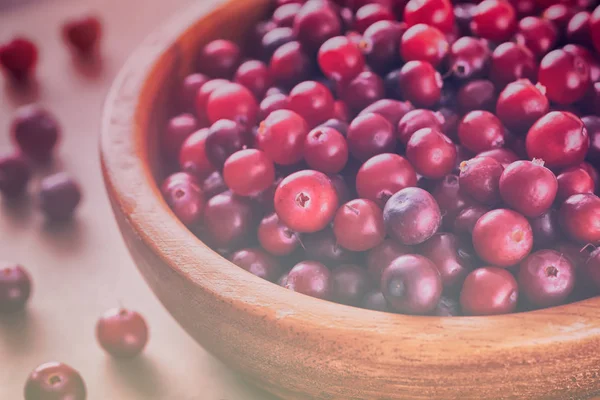 Cranberry in a wooden bowl — Stock Photo, Image