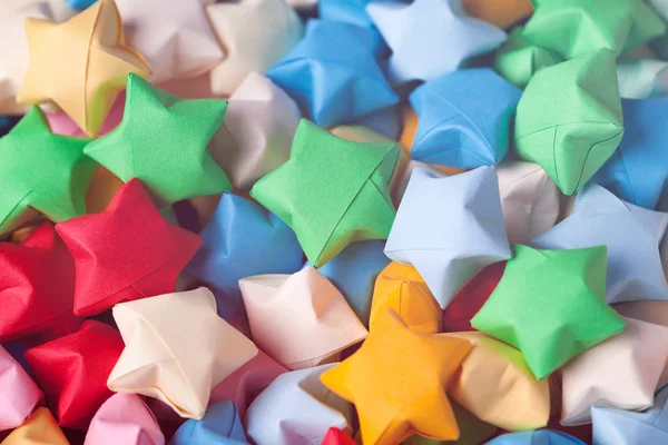 Colorato origami fortunato stelle sfondo — Foto Stock