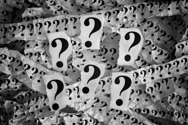 Question mark. Torn pieces of paper with question marks — Stock Photo, Image