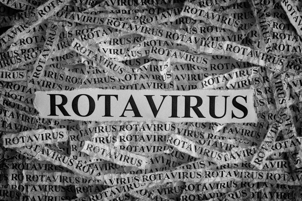 रोटाव्हायरस शब्द कागदाचे तुकडे वळले — स्टॉक फोटो, इमेज