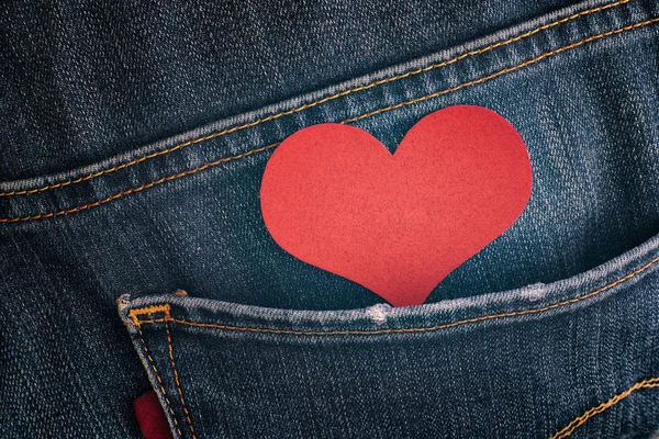 Red Paper Heart in pocket of jeans — Stock Photo, Image