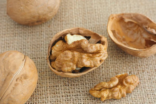 Cracked Walnut Near Others Walnuts — Stock Photo, Image