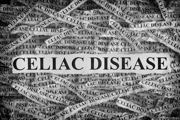 Torn pieces of paper with the words Celiac Disease — Stock Photo, Image