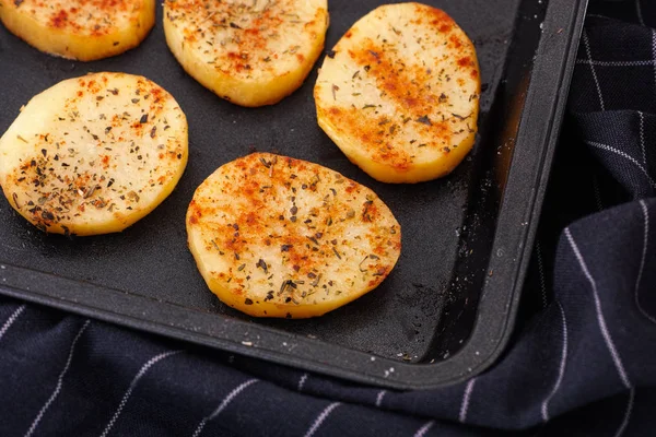 Baked potatoes with spices — Stock Photo, Image