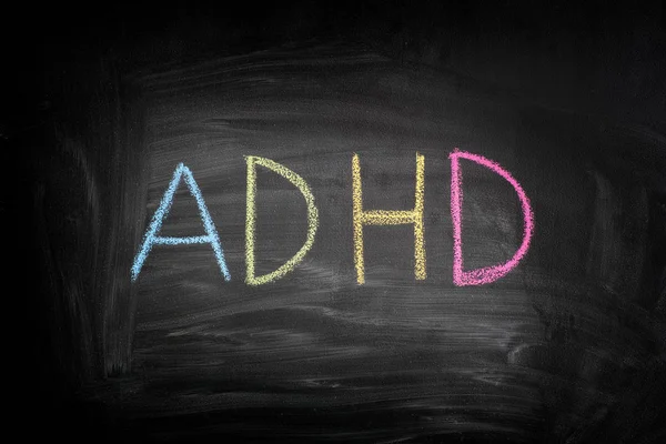 Abbreviation ADHD on a blackboard — Stock Photo, Image