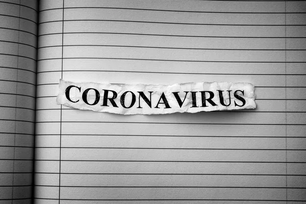 Tira de periódico con la palabra Coronavirus escrita en ella — Foto de Stock