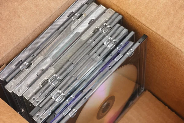 Old Collection Dvds Cds Some Dust Them Cardboard Box Close — Stock Photo, Image