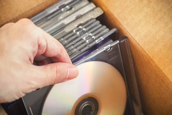Hand Taking Out Dvd Cardboard Box Close — Stock Photo, Image