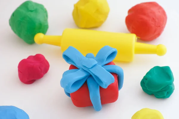 Play Clay Gift Wrapped Blue Ribbon Some Play Clay Balls — Stock Photo, Image