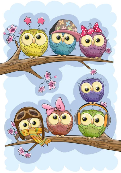 Cute Owls is sitting on a branches — Stock Vector