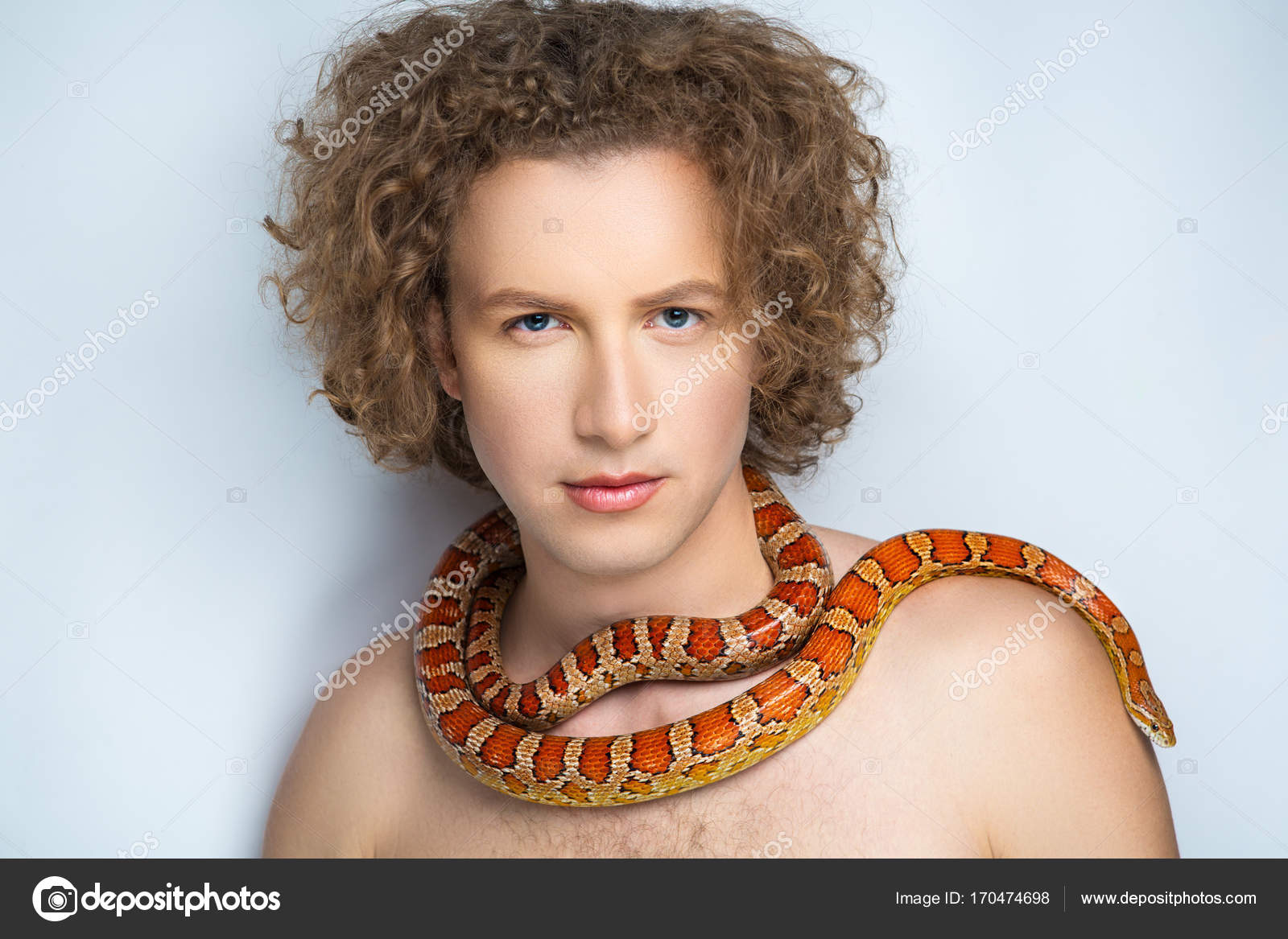 Man with snake Stock Photo by ©OlgaOsa 170474698