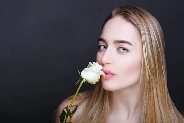 woman with white rose