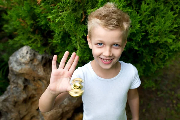 Boy with spinner — Stock Photo, Image