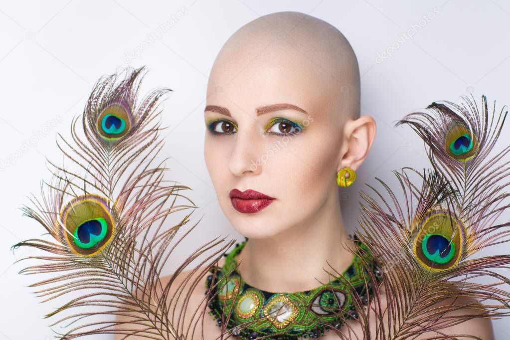 woman with peacock feathers