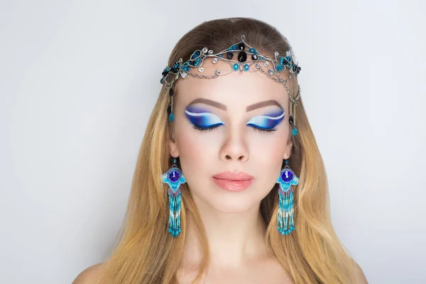Woman niebieski makijaż — Zdjęcie stockowe