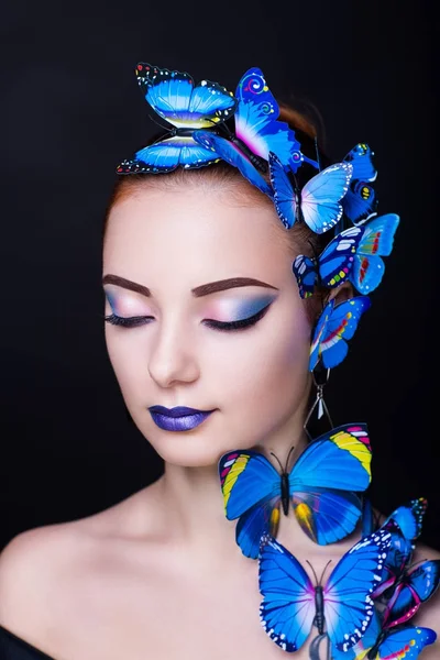 Vrouw blauwe vlinder — Stockfoto