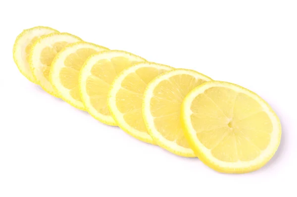 Lemon slices over white background — Stock Photo, Image