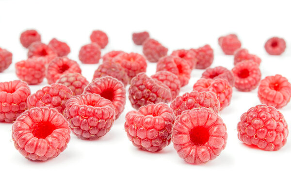 Sweet raspberries on white background