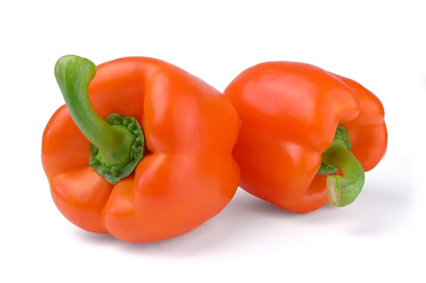 Duas pimentas vermelhas isoladas em fundo branco — Fotografia de Stock