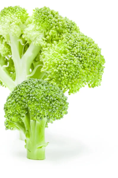 Čerstvé zelené brokolice izolovaných na bílém pozadí Vystřižení — Stock fotografie