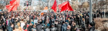 PENZA, RUSSIA - MARCH 26, 2017:  Moscovskaya street in the center of Penza churns with people as they protest corrupt government clipart