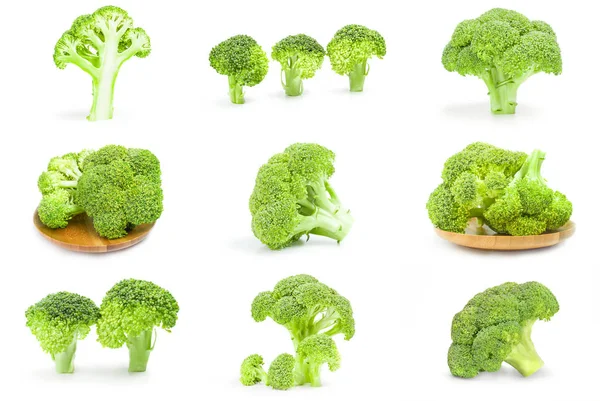 Set van verse groene broccoli geïsoleerd op een witte achtergrond met uitknippad — Stockfoto