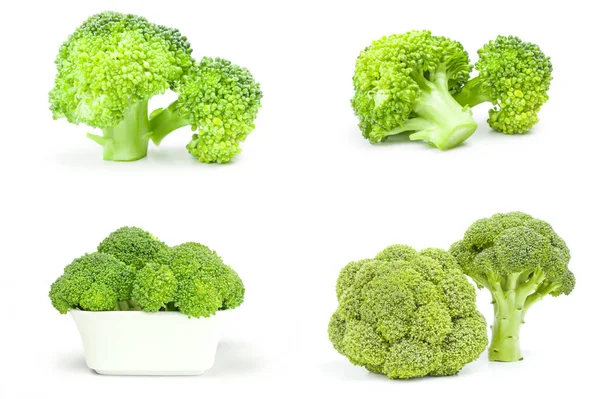 Groep van verse rauwe broccoli geïsoleerd op een witte knipsel — Stockfoto