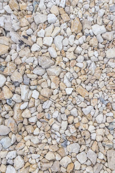 Straßenschotterbeschaffenheit. Schottergrund. Beschaffenheit der Steine. — Stockfoto
