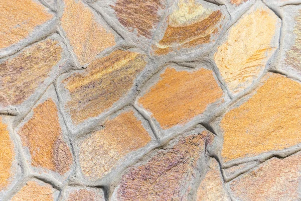 Vackra färgglada stenmur bakgrund — Stockfoto