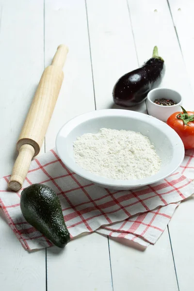 Baking ingredients and kitchen utensils on white background.  Cooking, baking, pastry or cookie cake ingredients