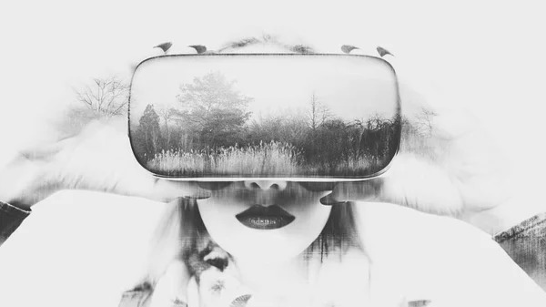 Attractive woman wearing virtual reality glasses. VR headset. Double exposure virtual reality concept. — Stock Photo, Image