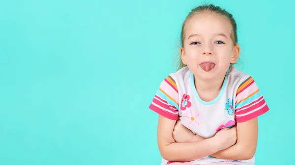 Adorable Little Girl Crossed Arms Sticking Her Tongue Out Cheeky — Stock Photo, Image