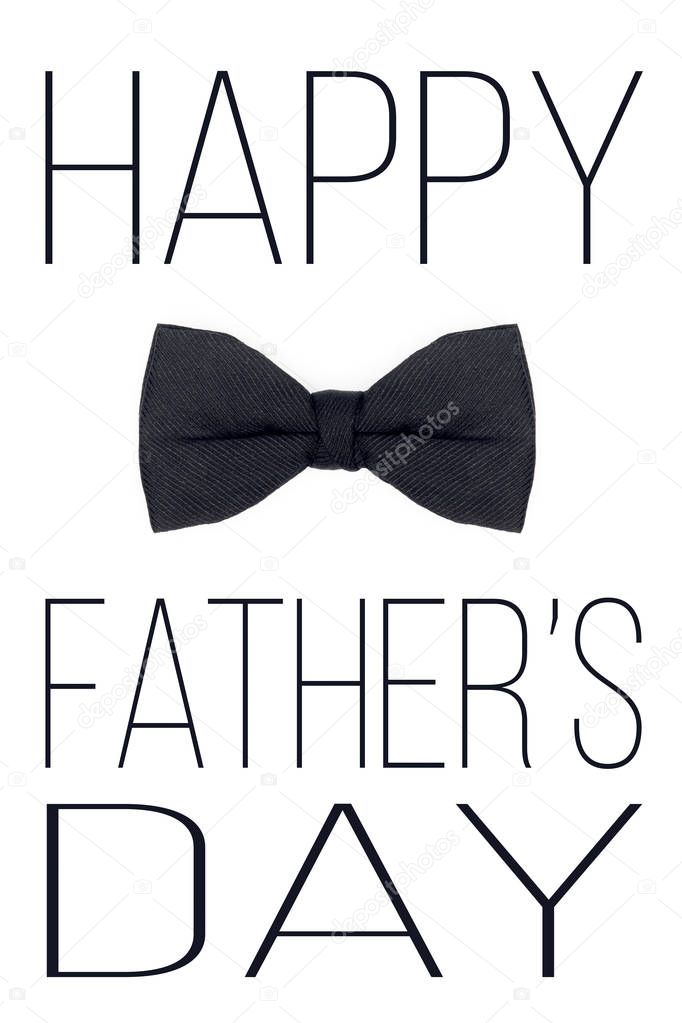 Happy Father's Day Background. Black bow tie on white background flat lay. Fathers day greeting card.