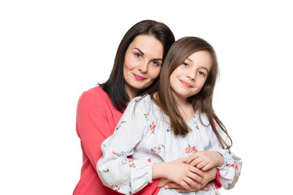 Waist Studio Portrait Cute Playful Schoolgirl Embracing Her Mother Happy — Stock Photo, Image