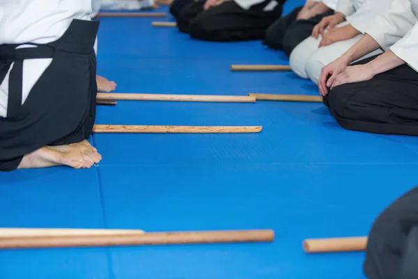People in kimono on martial arts weapon training — Stock Photo, Image