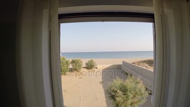 Looking out through the window at the sea in summer — Stock Video