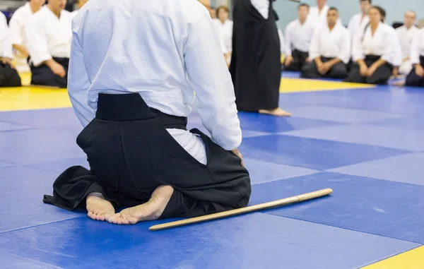 People in kimono on martial arts weapon training seminar — Stock Photo, Image