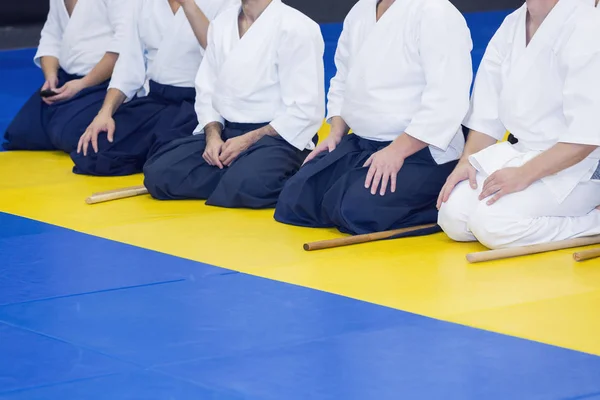 People in kimono on martial arts weapon training seminar — Stock Photo, Image