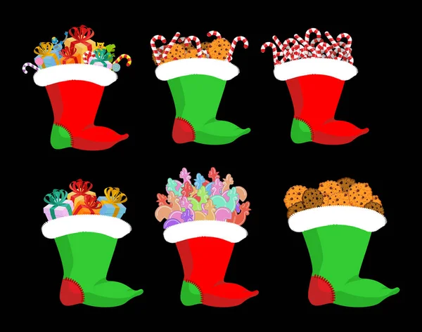 Medias de Navidad con set de regalos. Bastón de caramelo y galletas. altramuz — Vector de stock