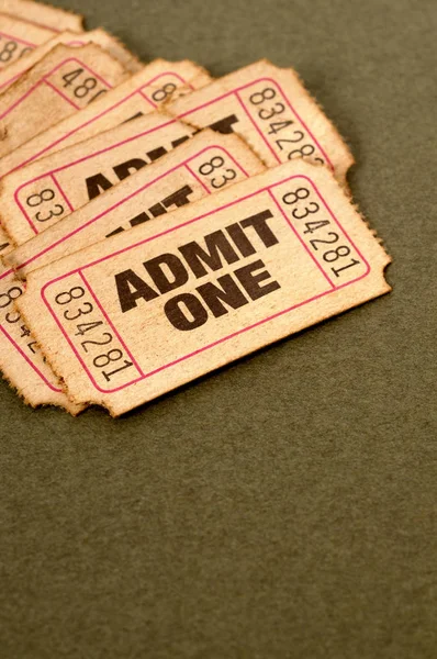Old used torn admit one tickets — Stock Photo, Image
