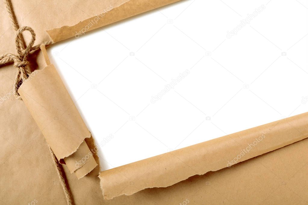 Torn brown paper package background
